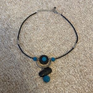 Greek Volcanic rock necklace- black and blue adjustable chain in back - like new